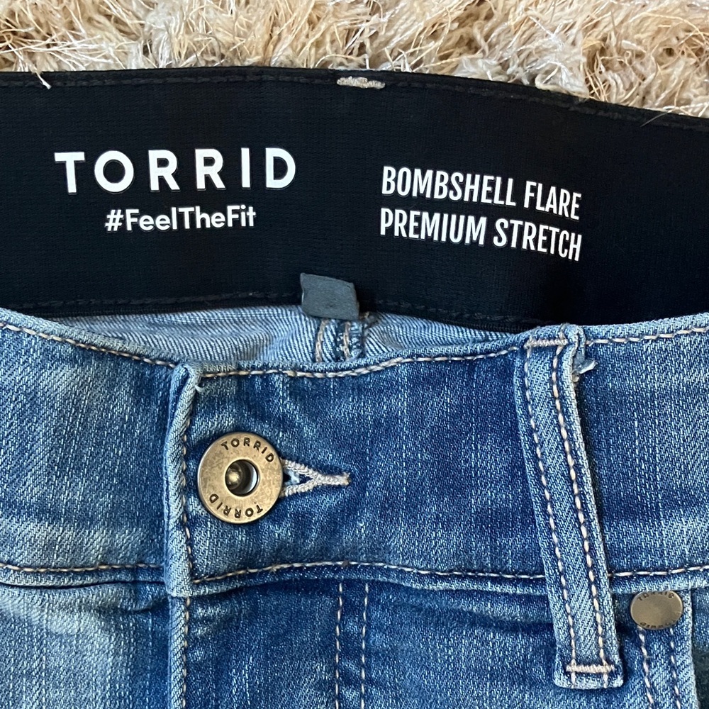 Torrid Distressed Blue Flare Jeans - Picture 2 of 5